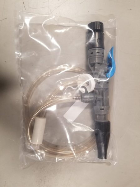 Sprayer and hose for Odor Butler foaming solution, wrapped in plastic for shipping