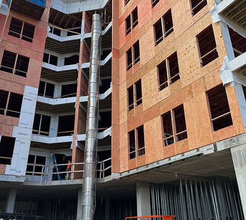 aluminum chute attached to building